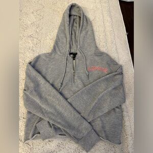 Grey cropped zip up, ‘London’ on the top left side.